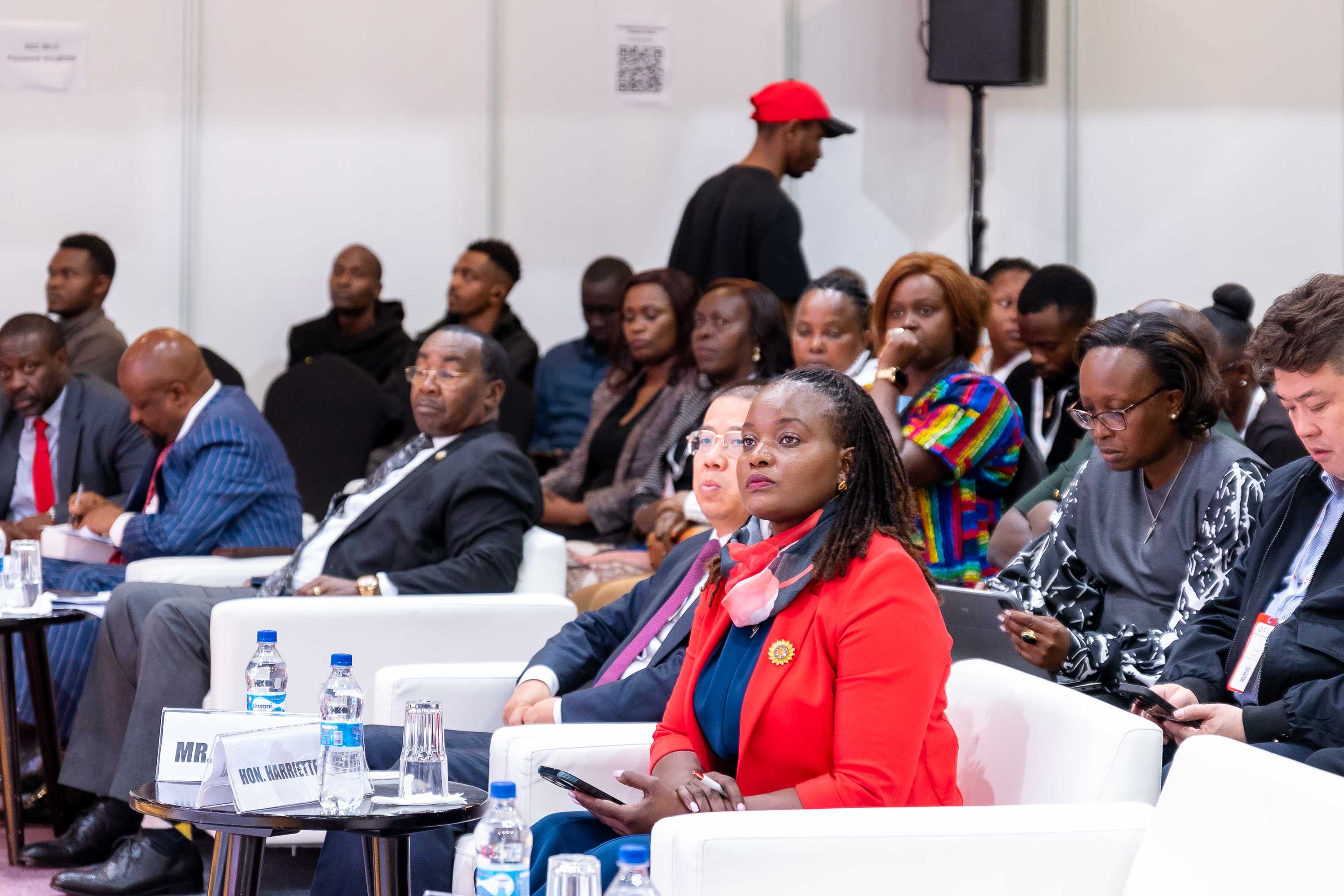 Guests seated in the front rows during a session