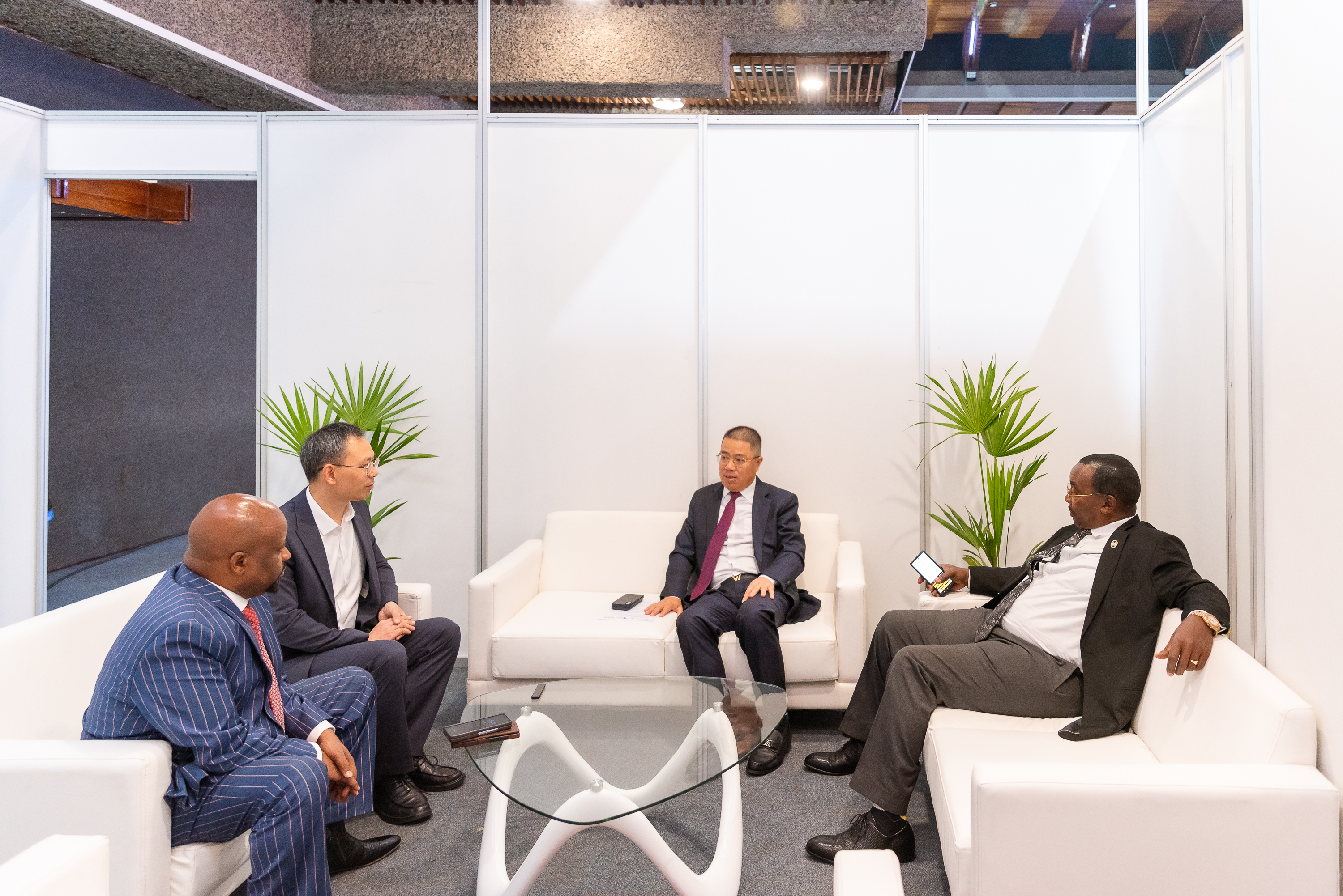 Guests in conversation in a meeting lounge