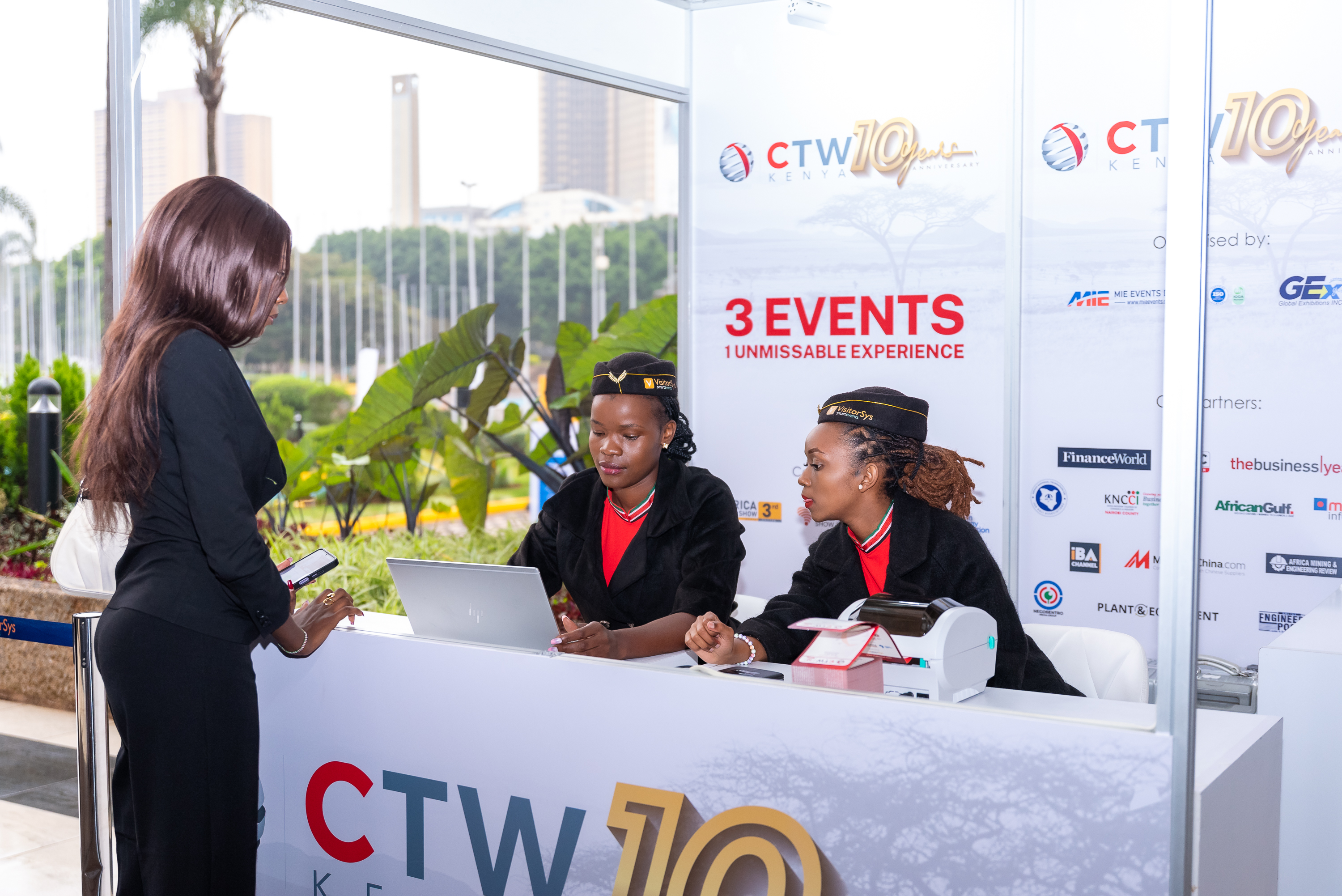 Guests checking in at the registration desk
