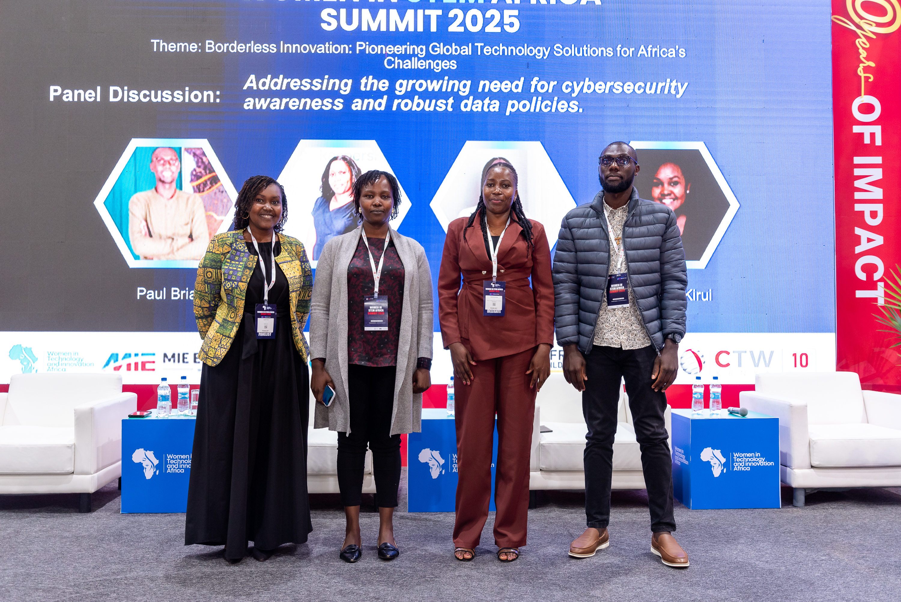 Panellists from the cybersecurity and data policy discussion on stage at the 2025 summit