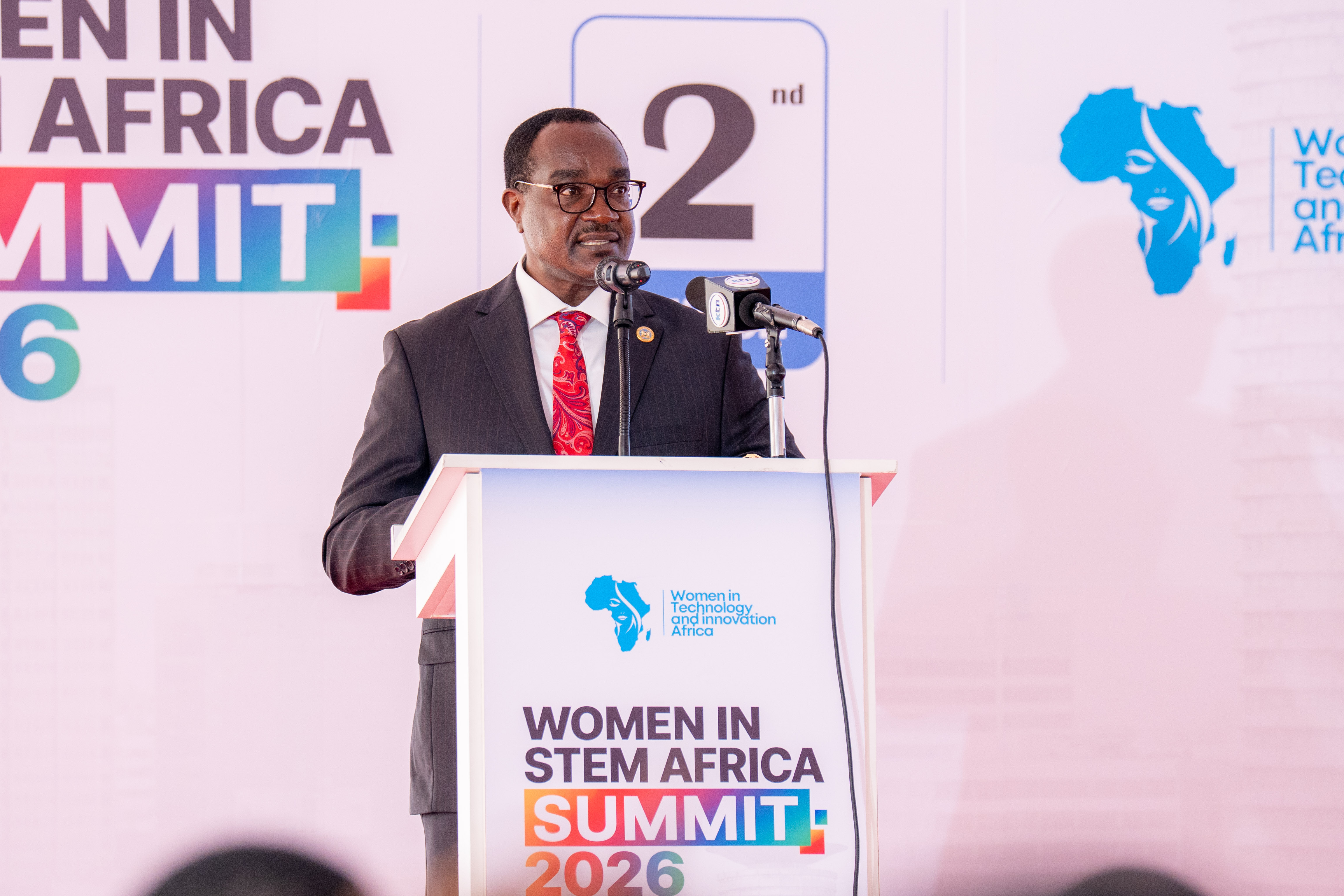 A guest speaker addressing the 2026 summit from the podium on day one