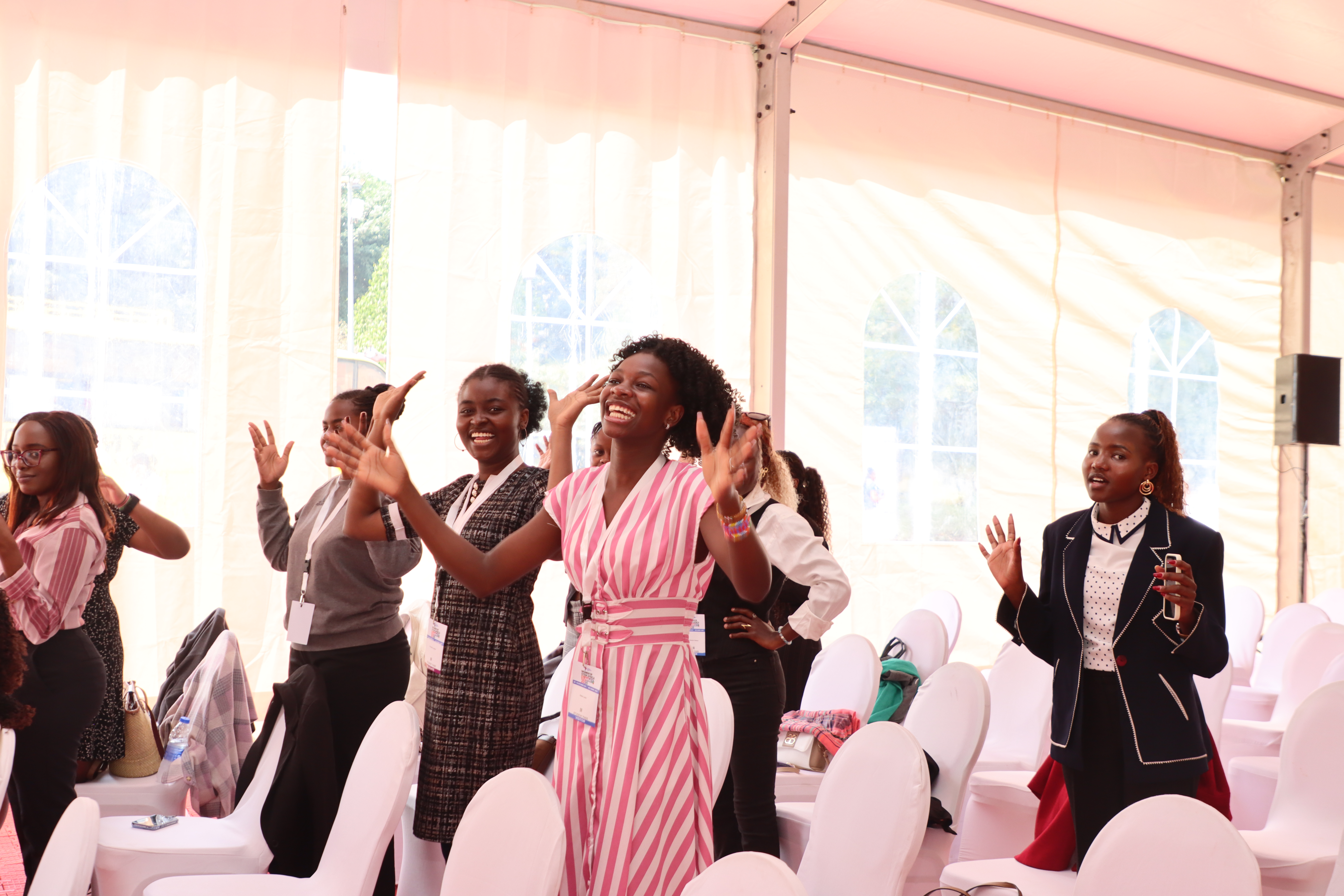 Attendees dancing between sessions in the main hall